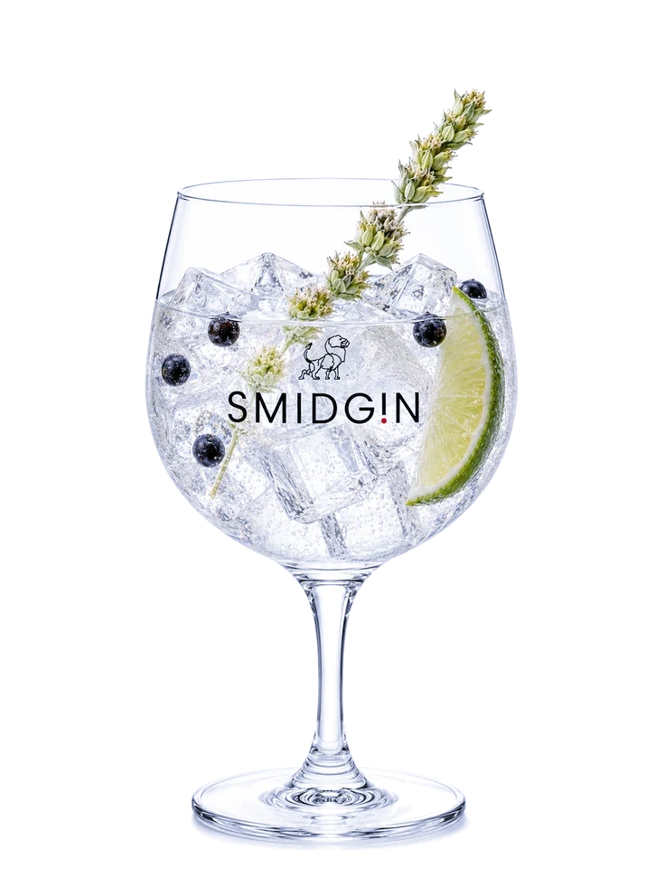 Smidgin and tonic garnished with juniper berries, mountain tea and lime